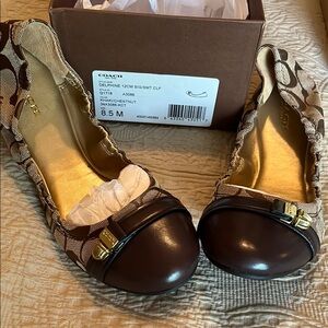 Coach Delphine Signature Chestnut Flats with Gold Accents